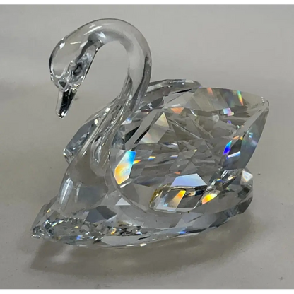 Large Swarovski crystal swan with three small swans
