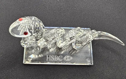 Crystal mouse figurine on a stand with HSBC logo