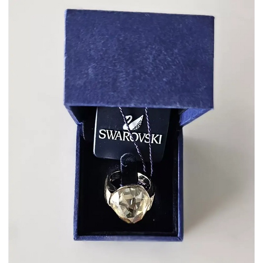 Swarovski ring in a blue box on a white background