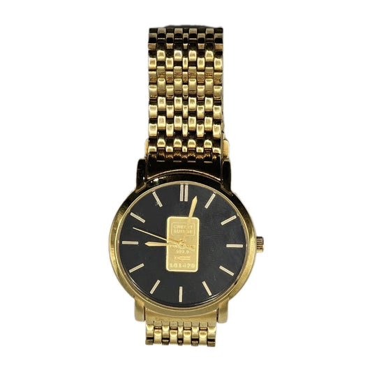 Gold watch with black face on a white background