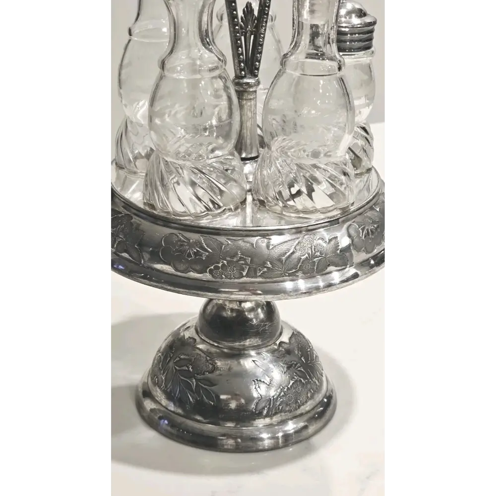 Close-up of Rogers & Bro. Silver Plated Caddy for Antique Cruet Set