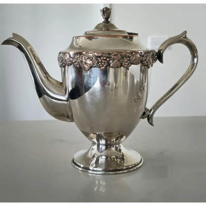 Decorative vintage silver plated tea set perfect for display or entertaining
