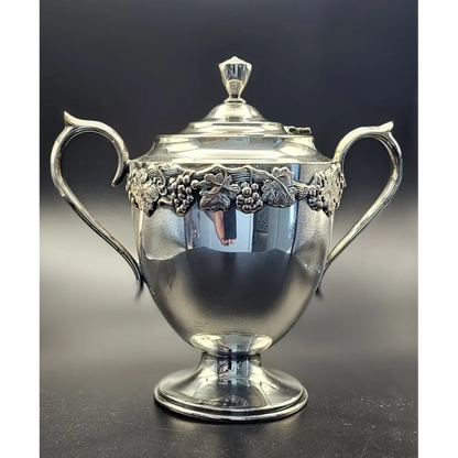 Elegant vintage silver tea set displayed for collectible or decorative use