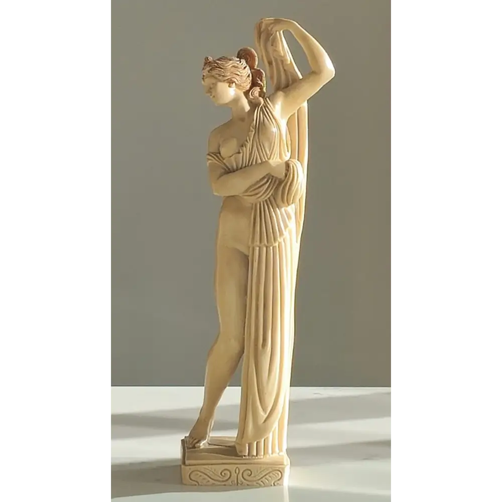 Front view of nude female Art Deco figurines with elegant pose