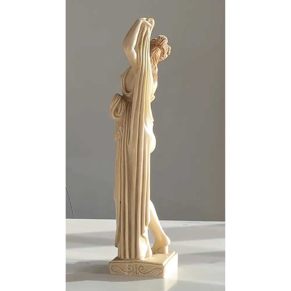 back view of nude female Art Deco figurines with elegant pose