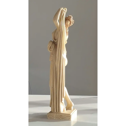 back view of nude female Art Deco figurines with elegant pose