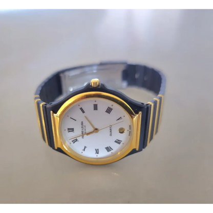 Wristwatch with gold and black strap