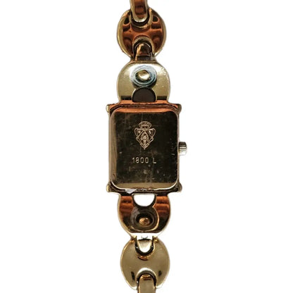 Gold watch with a visible brand logo
