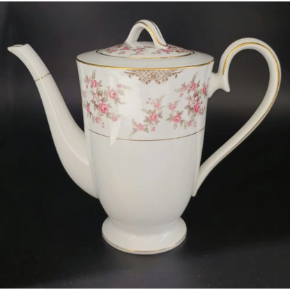 Side view of teapot with lid in the vintage Japan-made tea set