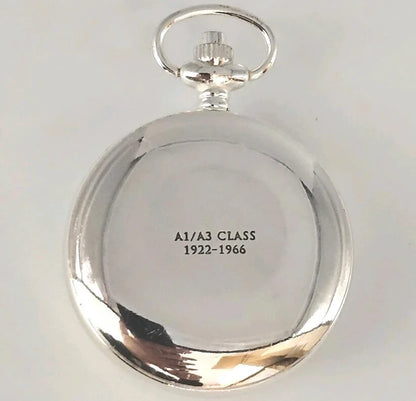 Silver pocket watch with engraved text on a white background
