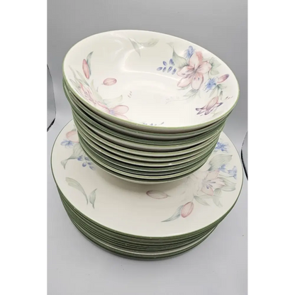 Stack of ceramic plates with floral patterns 