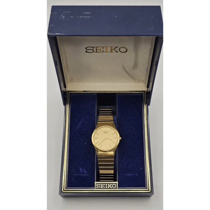 Gold Seiko watch in an open blue Seiko box 