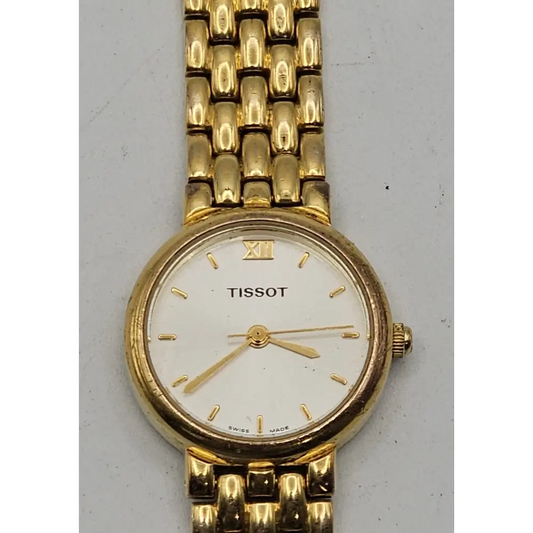 Gold Tissot watch