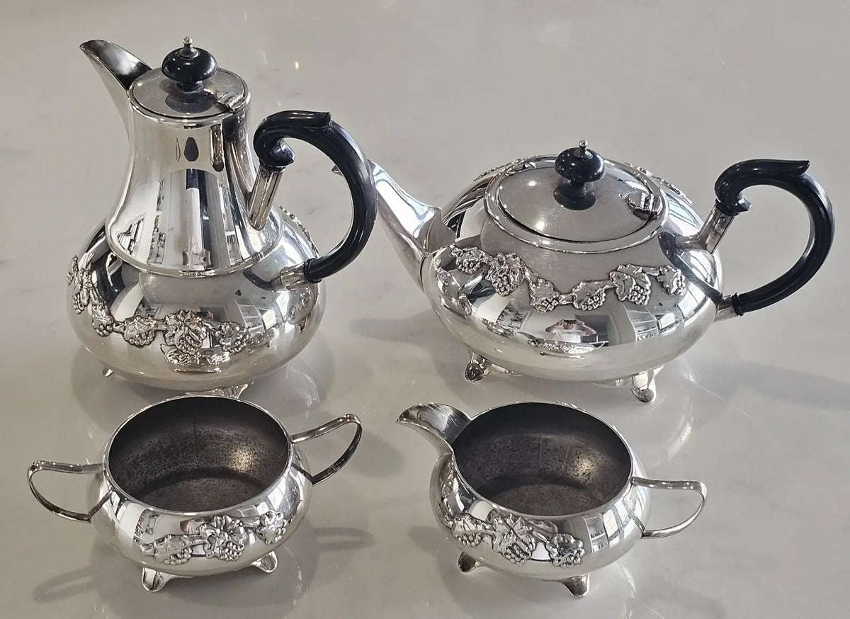 Vintage Waterhouse silver plated tea and coffee set with grape motif, four pieces