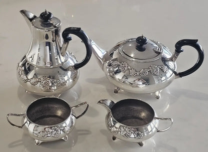 Vintage Waterhouse silver plated tea and coffee set with grape motif, four pieces