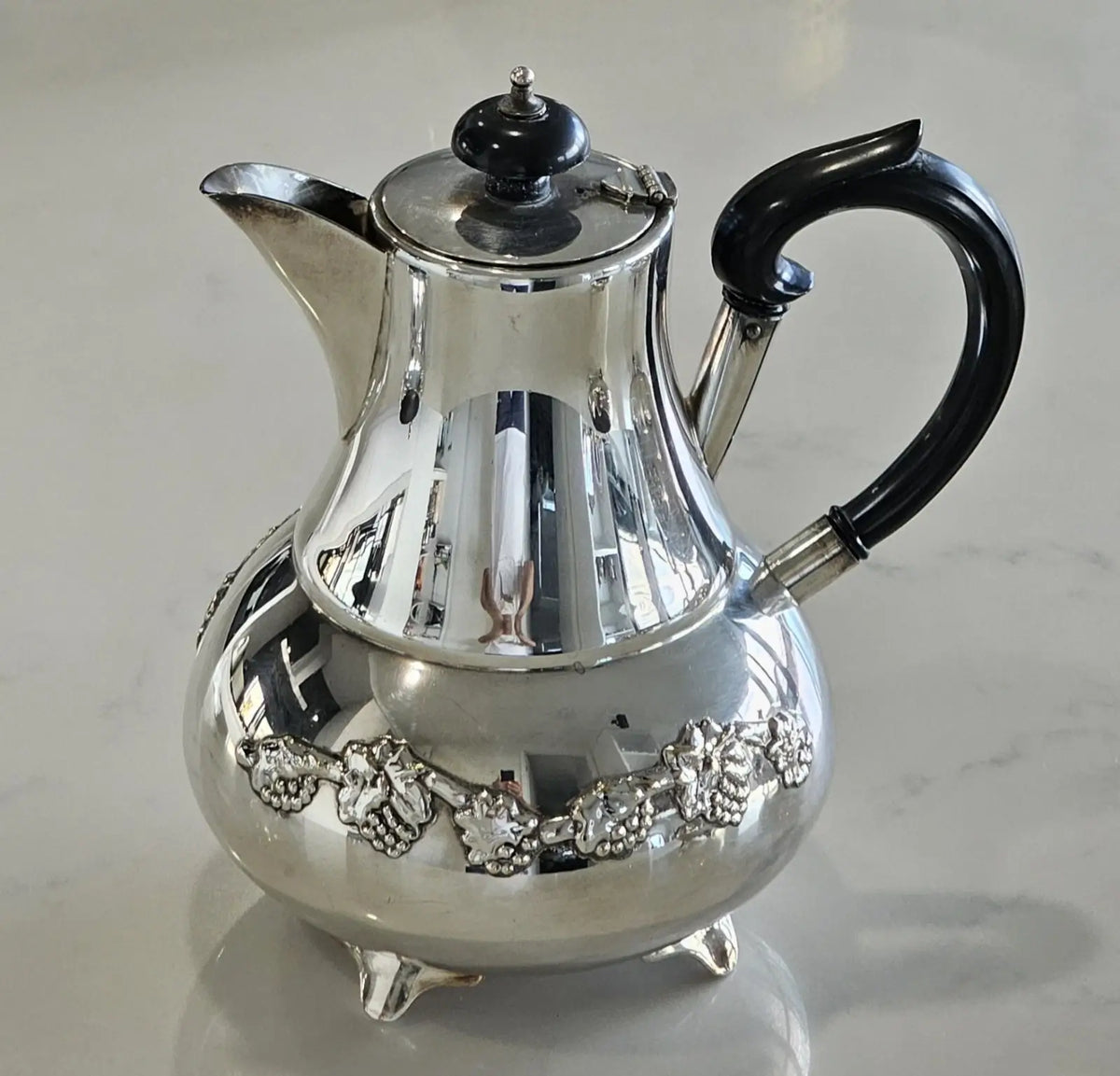 Waterhouse silver plated coffee pot with black handle and grape motif