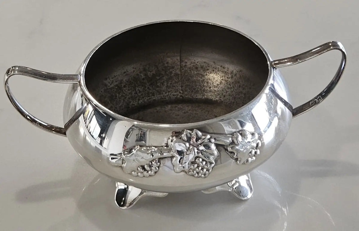 Waterhouse silver plated sugar bowl with grape and vine relief on footed base