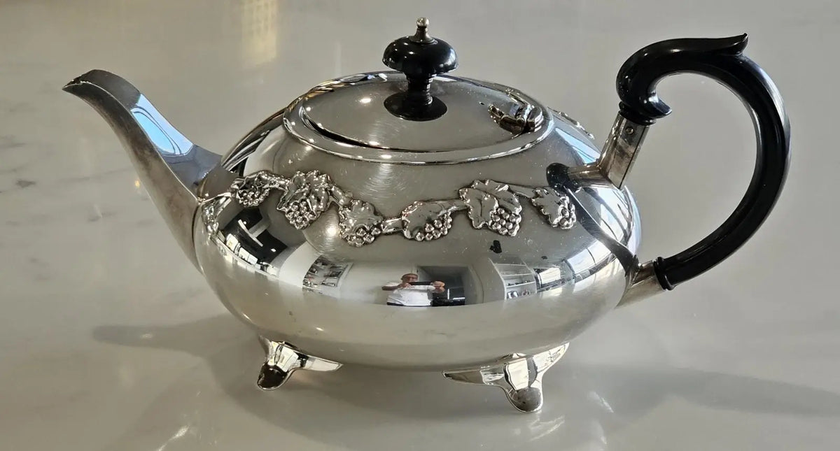 Waterhouse silver plated teapot with black handle and finial