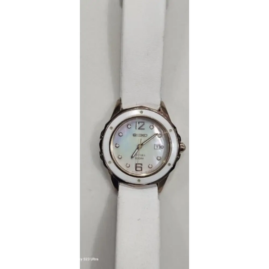 White wristwatch with a silver case