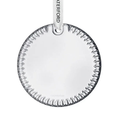 Round glass ornament with textured rim 
