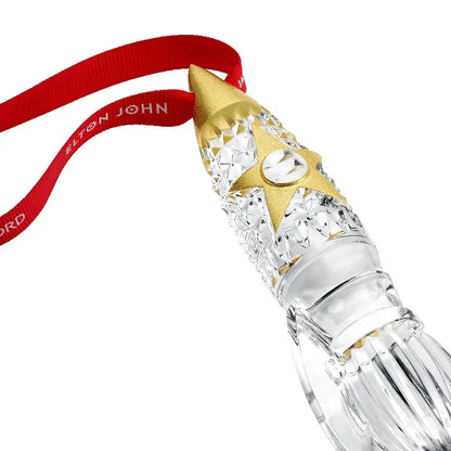 Decorative Ornaments with gold and silver accents and a red ribbon