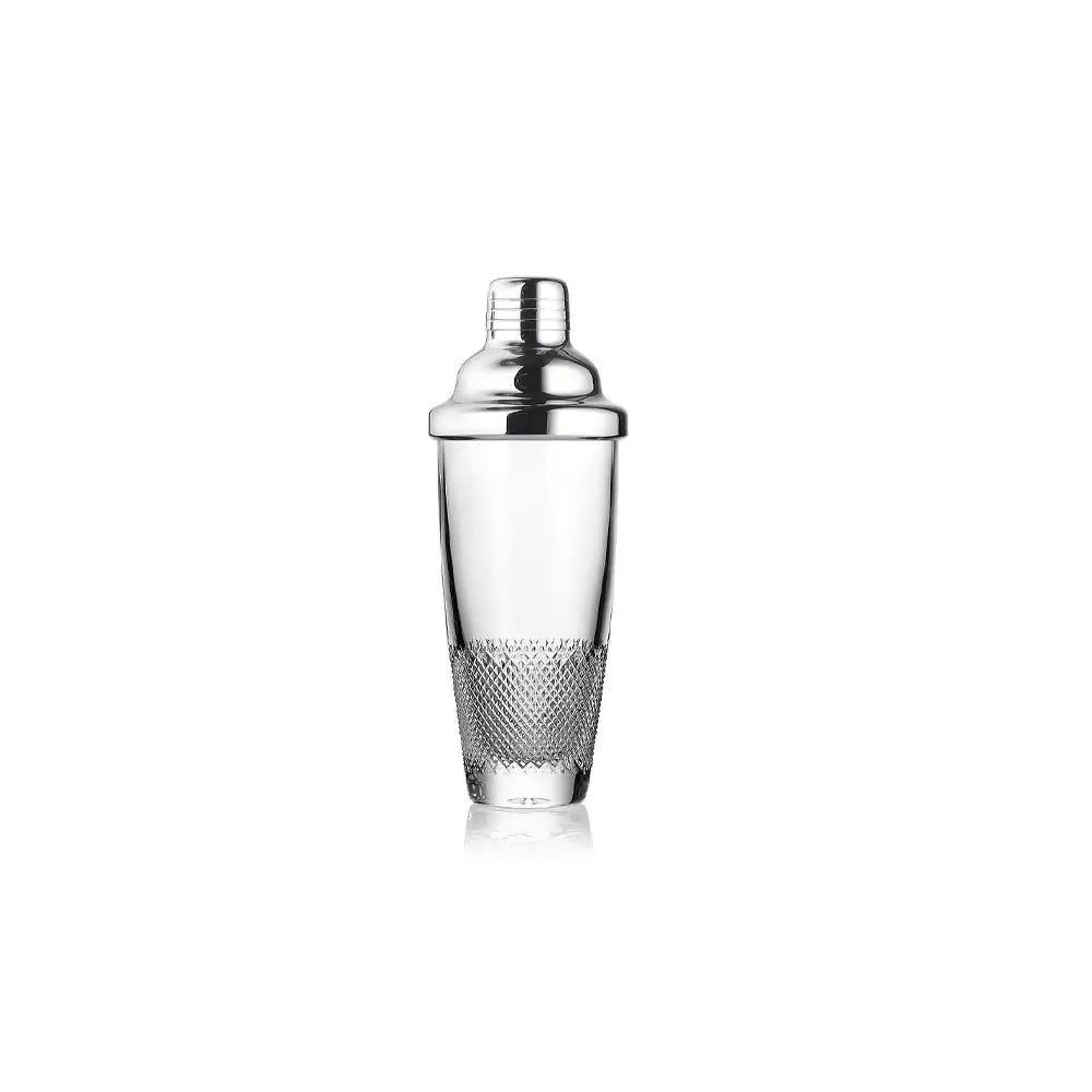 A clear glass cocktail shaker with a polished silver metal lid and a textured diamond-patterned lower section, centered on a solid white background from our Waterford Crystal Australia 