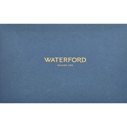 Blue surface with 'Waterford' branding in gold text