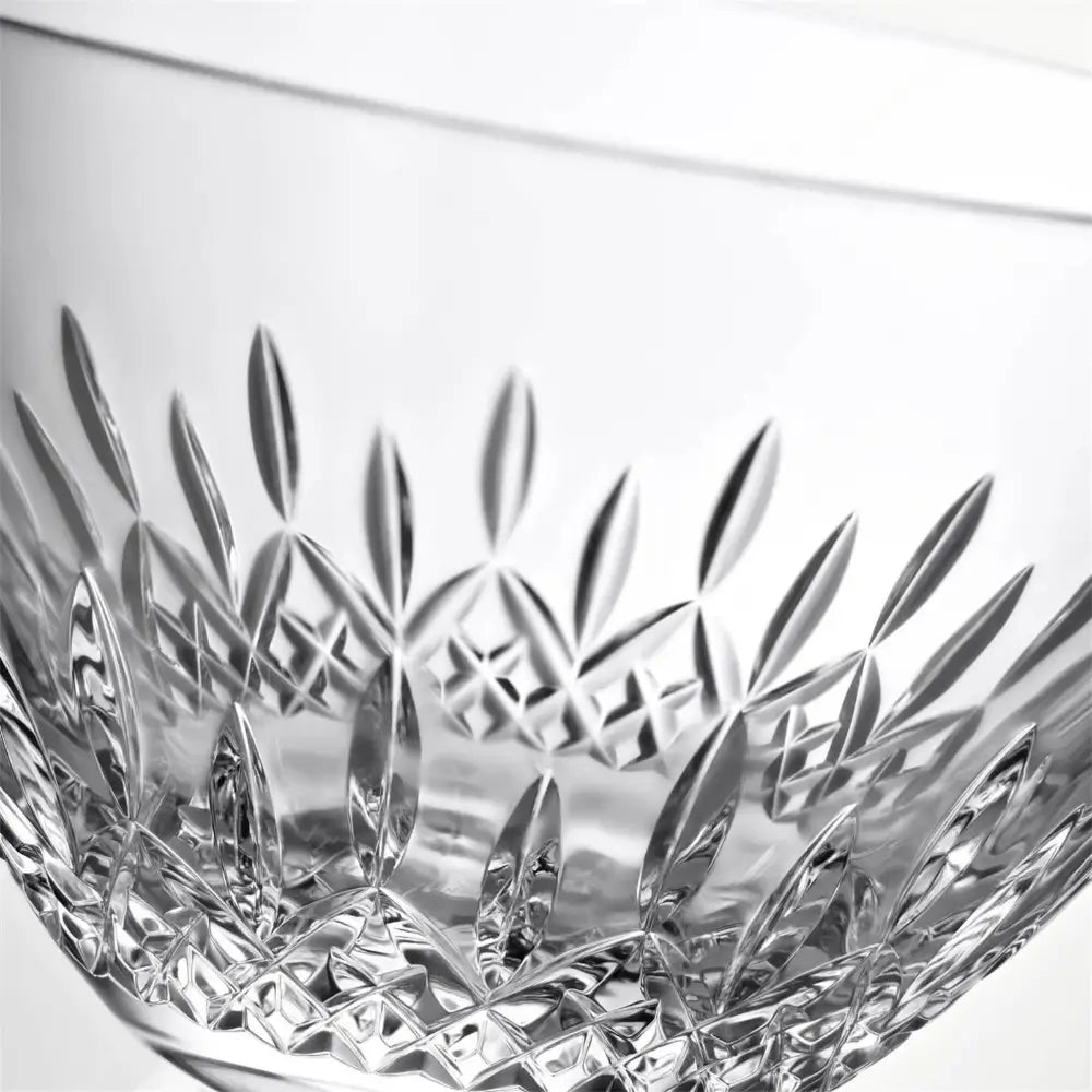 Close-up of the intricate diamond cuts on a Waterford Lismore Essence crystal bowl crafted in Slovenia.