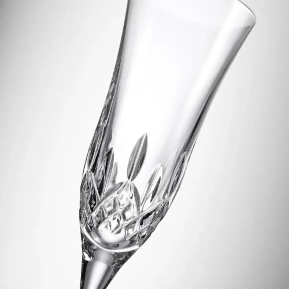 Elegant Waterford Lismore Essence flutes with signature diamond cuts