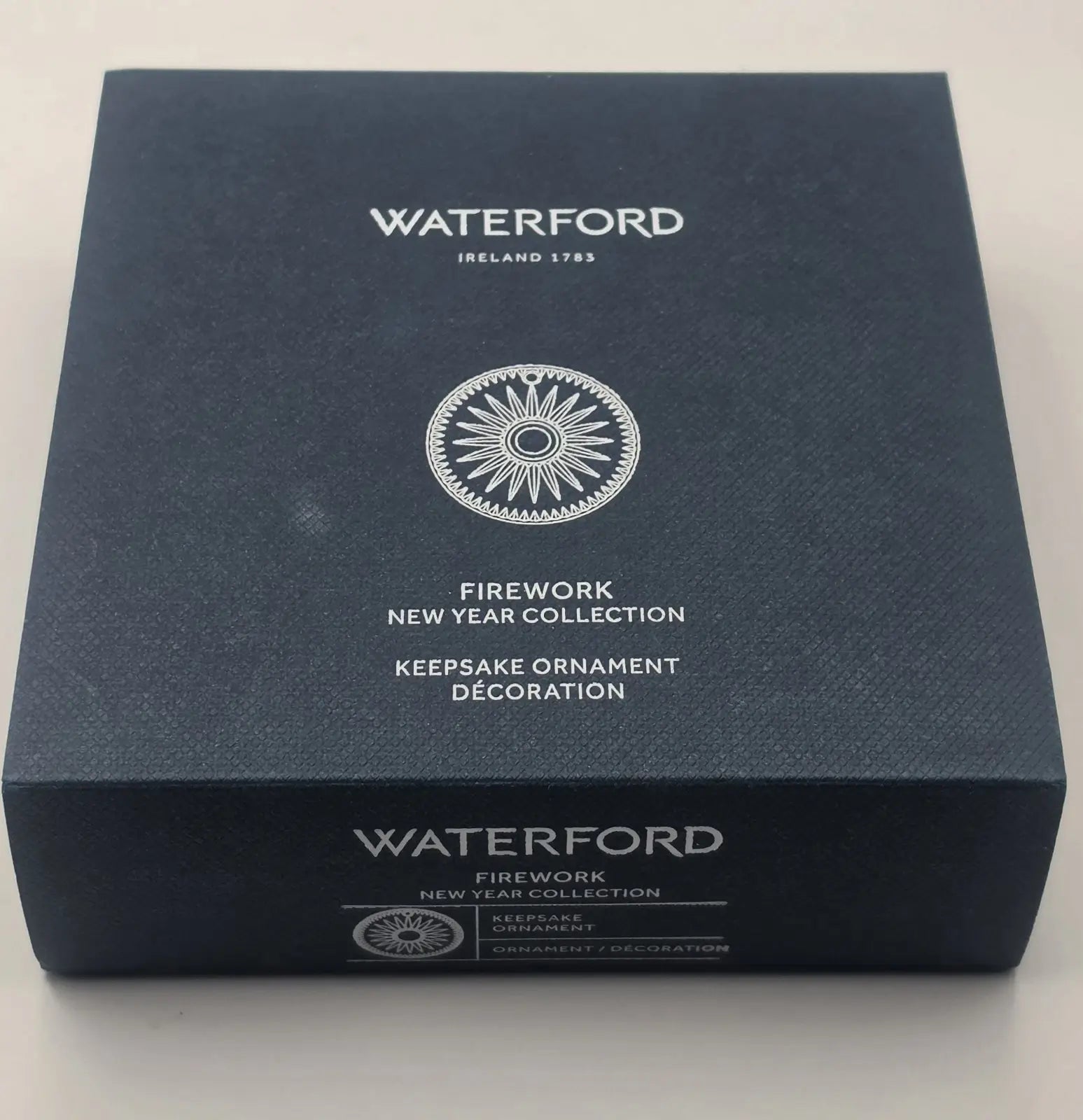Blue box with Waterford branding and text about a New Year collection on a white background