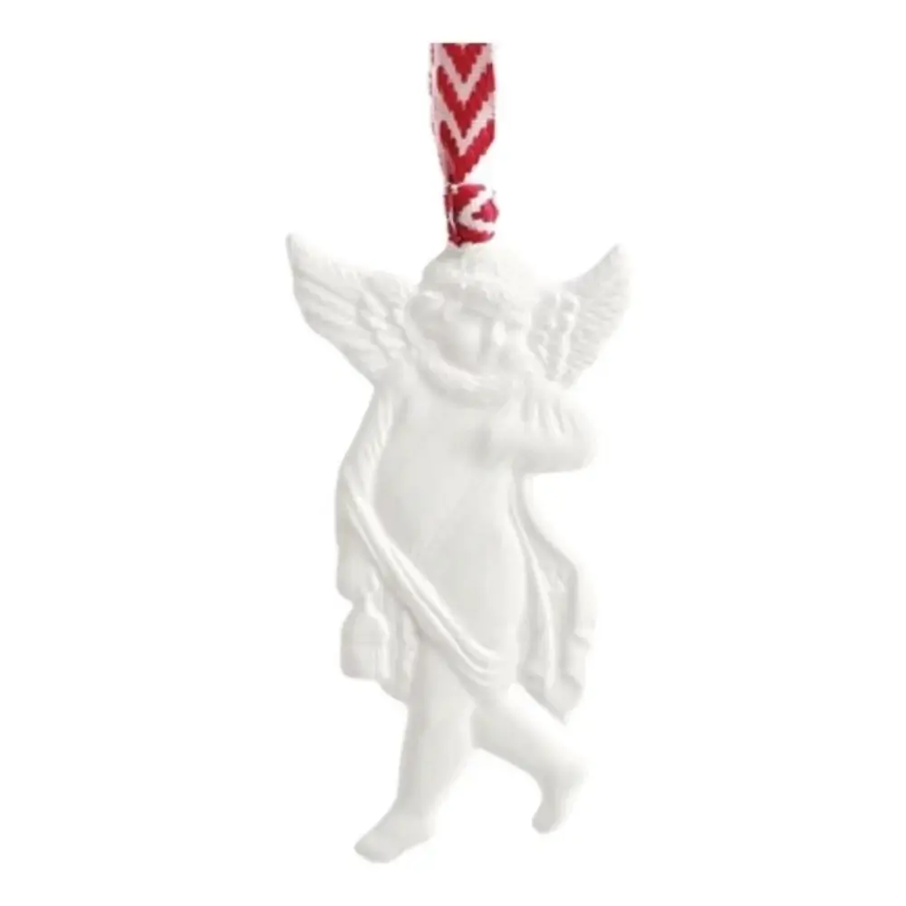 White ceramic reindeer ornament with red and white patterned string on a white background