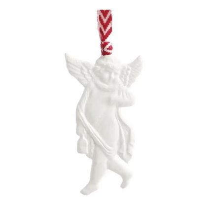White ceramic reindeer ornament with red and white patterned string on a white background