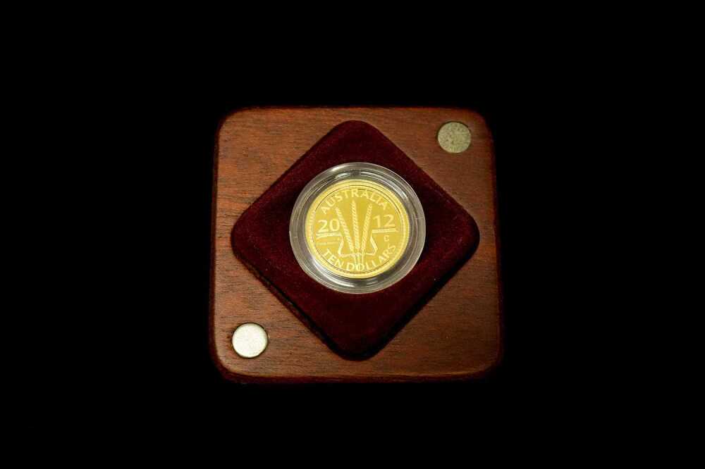 Wheat Sheaf Dollar 2012 gold proof coin in wooden presentation case