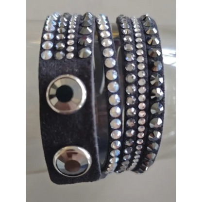 Black leather wrap bracelet with silver studs and buttons