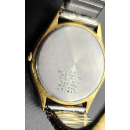 Back view of a Seiko watch with visible branding and model number.