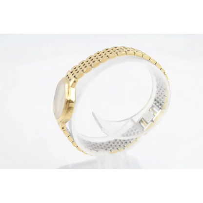 Gold and silver ring on a white background