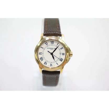 Wristwatch with gold case and brown leather strap 