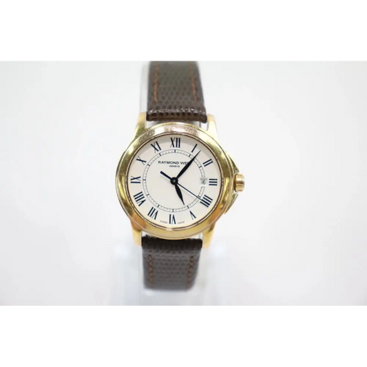 Wristwatch with gold case and brown leather strap 