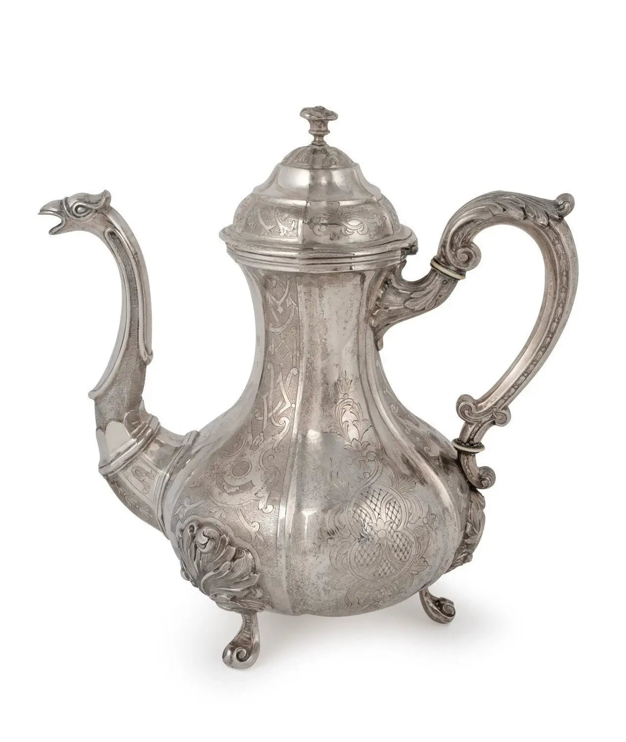 An ornate silver teapot with a decorative bird-shaped spout, a curved handle, and a lid, shown on a plain white background from our Antique & Vintage Collectibles Australia collection