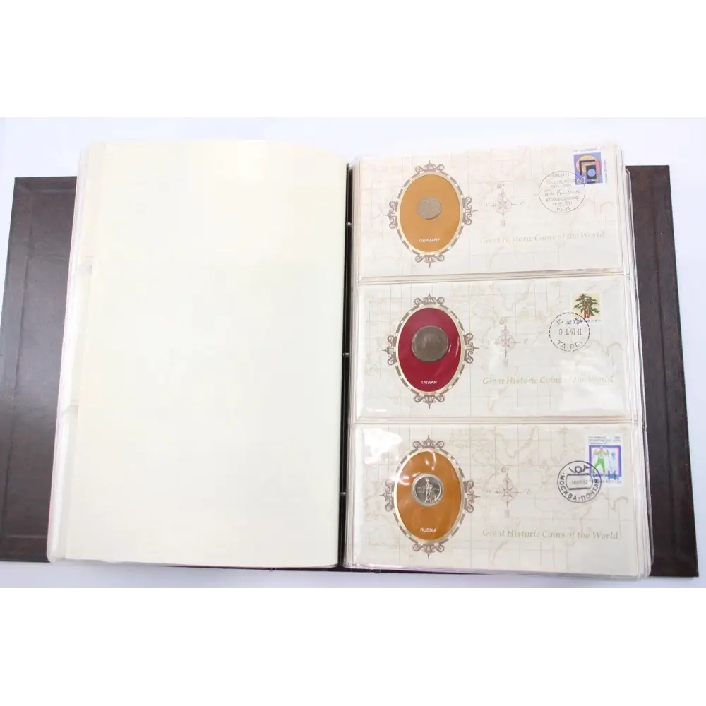 An open coin or collectible album binder showing several pages with postage-style stamps and circular coin inserts, photographed against a plain white background.