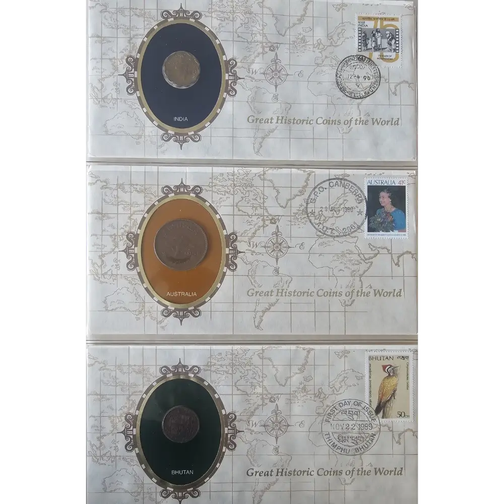 Three stacked collectible coin envelopes from Great Historic Coins of the World, each featuring a different coin from India, Australia, and Sri Lanka with postage stamps and country seals.