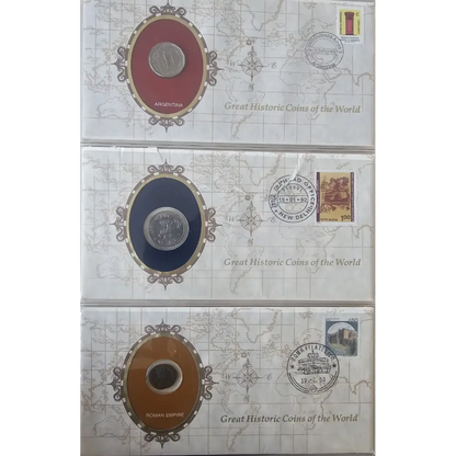 Three collectible coin packaging boxes stacked vertically, each featuring an oval coin display with different colored medallions and postage stamp designs on a light map-patterned background.