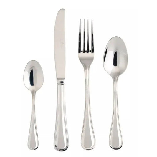Set of silver cutlery including a knife, fork, and two spoons