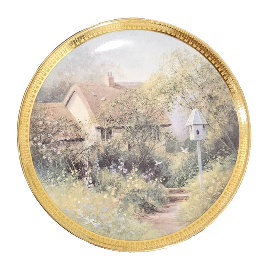 Decorative plate with a garden scene