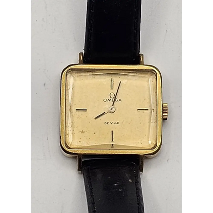 Vintage Omega watch with gold case and black strap