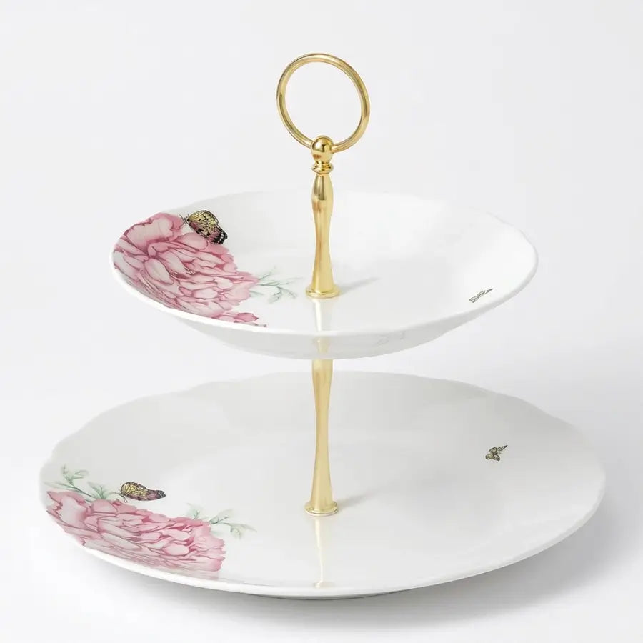 A two-tier ceramic serving stand with a gold-tone metal frame and handle, decorated with pink peony flowers and small butterflies on a white background from our Royal Albert Bone China Australia collection 