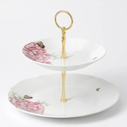 A two-tier ceramic serving stand with a gold-tone metal frame and handle, decorated with pink peony flowers and small butterflies on a white background from our Royal Albert Bone China Australia collection 