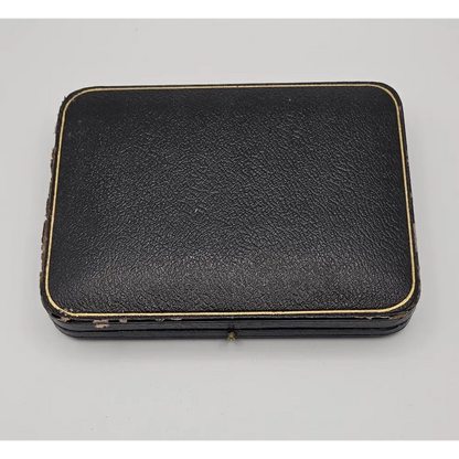 Black leather case on a gray background