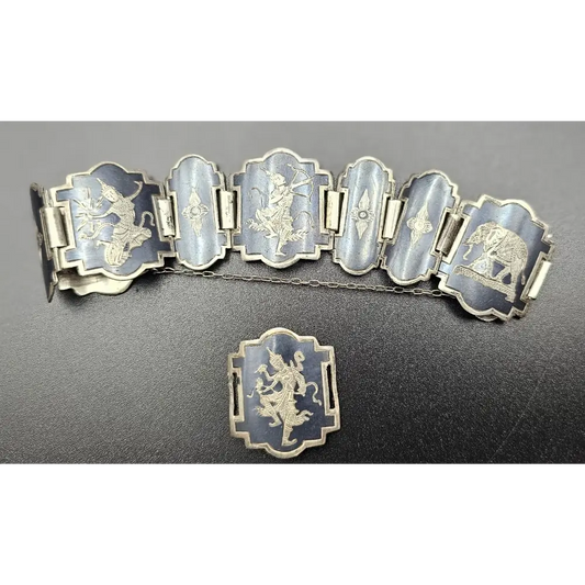 Silver bracelet with engraved designs