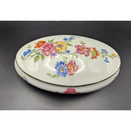 Vintage Limoges porcelain trinket box with hand-painted floral design
